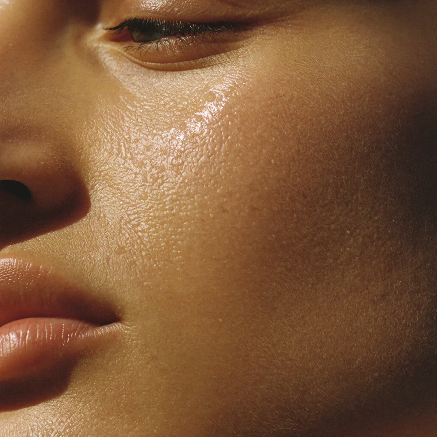 Close, calm skin in soft natural light